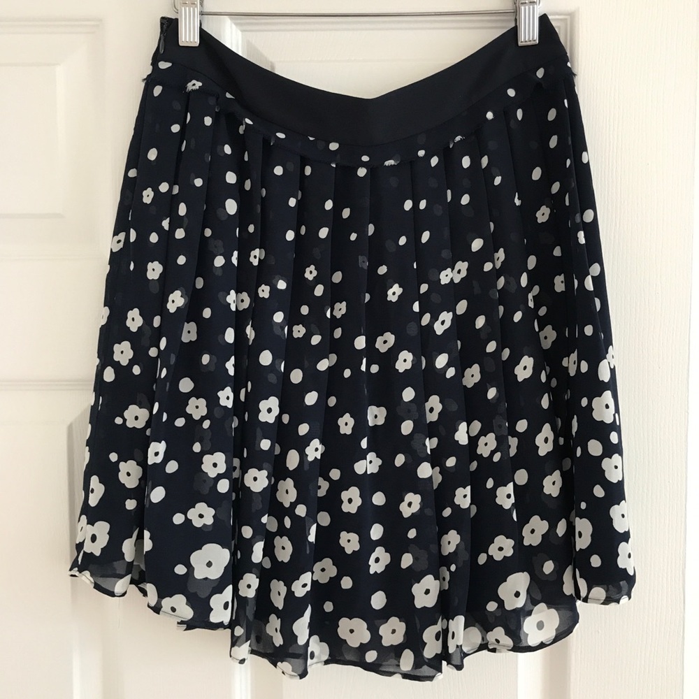 Navy mini skirt with flower patterns